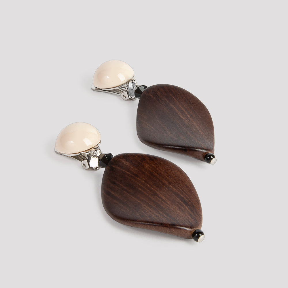 
                      
                        Clip wooden earrings - Angela Caputi
                      
                    